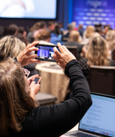 NSPRA member taking a photo at an NSPRA Seminar.